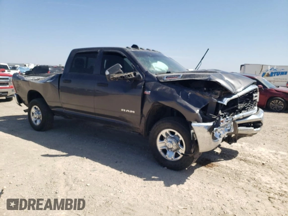 2021 Ram 2500 Tradesman with VIN 3C6UR5CJ0MG561557, listed as a Copart auction lot 50976935 with 98,567 mi miles and Salvage title. Bid and sale history available at DreamBid. Image 4.