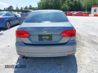 2014 Volkswagen Jetta S z VIN 3VW2K7AJ6EM253571, wystawiony jako IAAI lot #42186222 z przebiegiem 171 518 mil mil oraz . Historia ofert i sprzedaży dostępna na DreamBid. Obrazek 16.