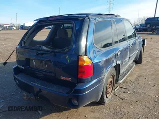 2004 GMC Envoy SLE z VIN 1GKDS13S842152119, wystawiony jako IAAI lot #41187115 z przebiegiem 194 304 mil mil oraz . Historia ofert i sprzedaży dostępna na DreamBid. Obrazek 4.