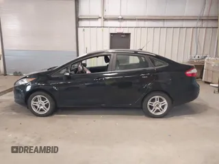 2018 Ford Fiesta SE z VIN 3FADP4BJ3JM141658, wystawiony jako IAAI lot #41737201 z przebiegiem 92 078 mil mil oraz . Historia ofert i sprzedaży dostępna na DreamBid. Obrazek 14.