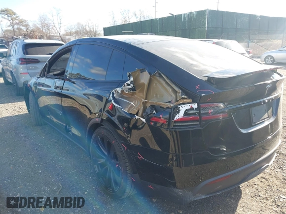 2023 Tesla Model X with VIN 7SAXCAE59PF377408, listed as a IAAI auction lot 41176738 with 32,496 mi miles and . Bid and sale history available at DreamBid. Image 3.