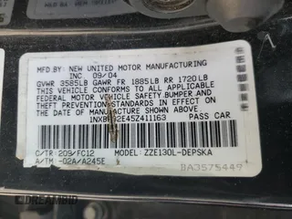 2005 Toyota Corolla CE with VIN 1NXBR32E45Z411163, listed as a Copart auction lot 44561615 with 185,479 mi miles and Salvage Title. Bid and sale history available at DreamBid. Image 12.