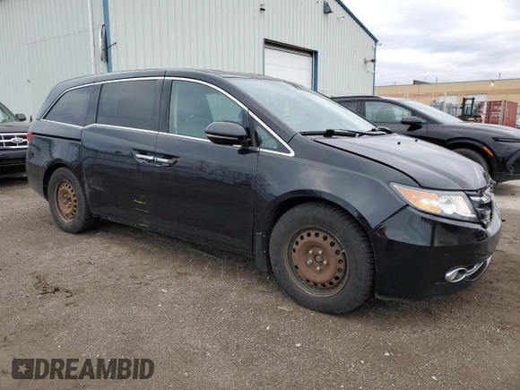 2015 Honda Odyssey Touring Elite with VIN 5FNRL5H91FB504095, listed as a Copart auction lot 53868125 with 176,272 mi miles and Salvage Title. Bid and sale history available at DreamBid. Image 4.