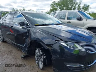 2015 Lincoln MKZ z VIN 3LN6L2G99FR625258, wystawiony jako IAAI lot #42308188 z przebiegiem 186 911 mil mil oraz . Historia ofert i sprzedaży dostępna na DreamBid. Obrazek 6.
