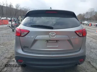2013 Mazda CX-5 Touring with VIN JM3KE2CE9D0133348, listed as a IAAI auction lot 41357592 with 122,227 mi miles. Bid and sale history available at carsss.com. Image 15.