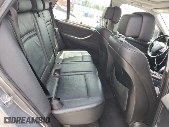 2012 BMW X5 35i with VIN 5UXZV4C50CL991452, listed as a Copart auction lot 56890265 with 147,019 mi miles and Salvage title. Bid and sale history available at DreamBid. Image 11.