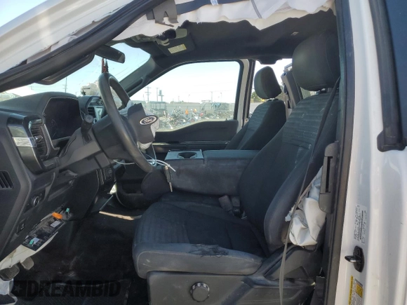2021 Ford F-150 XL with VIN 1FTFX1E56MKD34057, listed as a Copart auction lot 63997585 with 99,679 mi miles and Clean title. Bid and sale history available at DreamBid. Image 7.