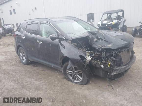 2018 Hyundai Santa Fe 2.4L z VIN 5NMZUDLB7JH098638, wystawiony jako IAAI lot #42055793 z przebiegiem 63 516 mil mil oraz . Historia ofert i sprzedaży dostępna na DreamBid. Obrazek 1.
