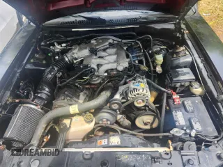 2002 Ford Mustang Standard with VIN 1FAFP40412F170034, listed as a Copart auction lot 61275825 with 174,868 mi miles and Salvage title. Bid and sale history available at DreamBid. Image 7.