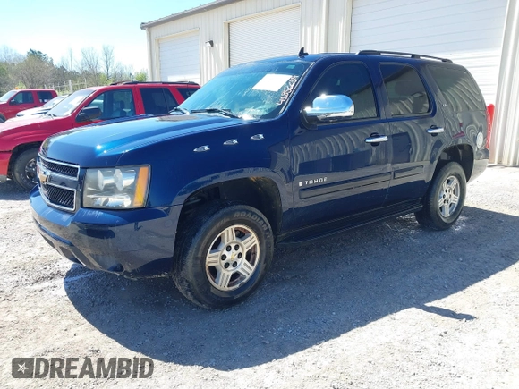 2007 Chevrolet Tahoe LTZ with VIN 1GNFC13077R243921, listed as a IAAI auction lot 41856659 with Not provided miles and . Bid and sale history available at DreamBid. Image 2.