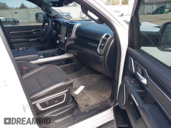 2023 Ram 1500 Laramie with VIN 1C6SRFJT8PN520610, listed as a IAAI auction lot 41898526 with 23,605 mi miles and . Bid and sale history available at DreamBid. Image 5.