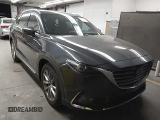 2017 Mazda CX-9 Grand Touring z VIN JM3TCADY2H0134070, wystawiony jako IAAI lot #41611243 z przebiegiem 87 046 mil mil oraz . Historia ofert i sprzedaży dostępna na DreamBid. Obrazek 1.