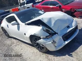 2015 Nissan 370Z Sport with VIN JN1AZ4EH9FM443719, listed as a IAAI auction lot 41677286 with 87,967 mi miles and . Bid and sale history available at DreamBid. Image 1.