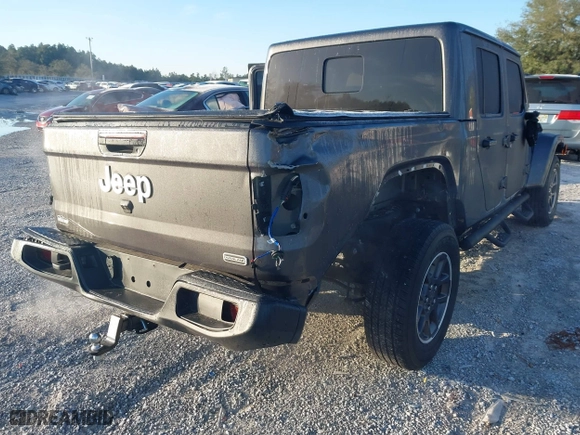 2023 Jeep Gladiator Overland with VIN 1C6HJTFG1PL546604, listed as a IAAI auction lot 41599632 with 23,108 mi miles. Bid and sale history available at carsss.com. Image 6.