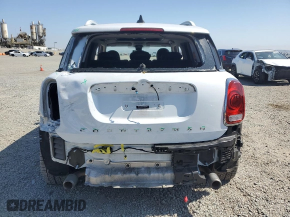 2020 MINI Countryman Cooper S with VIN WMZYW7C01L3L86999, listed as a Copart auction lot 60845345 with 74,438 mi miles and Salvage title. Bid and sale history available at DreamBid. Image 6.
