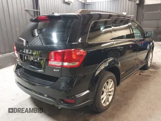 2017 Dodge Journey SXT z VIN 3C4PDDBG2HT658969, wystawiony jako IAAI lot #41878123 z przebiegiem 90 276 mil mil oraz . Historia ofert i sprzedaży dostępna na DreamBid. Obrazek 4.