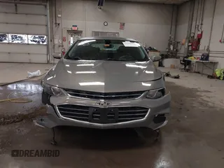2018 Chevrolet Malibu LT z VIN 1G1ZD5ST0JF185111, wystawiony jako IAAI lot #41910563 z przebiegiem 84 784 mil mil oraz . Historia ofert i sprzedaży dostępna na DreamBid. Obrazek 12.