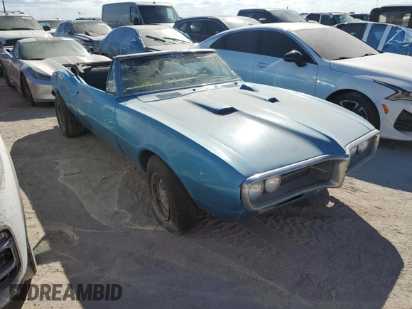 1967 Pontiac Firebird z VIN 223677U101685, wystawiony jako Copart lot #74851504 z przebiegiem 68 172 mil mil oraz Nie do naprawy • Non repairable. Historia ofert i sprzedaży dostępna na DreamBid. Obrazek 4.