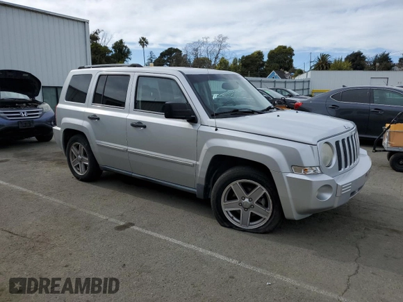 2008 Jeep Patriot Limited with VIN 1J8FT48W28D700911, listed as a Copart auction lot 47452615 with 152,602 mi miles and Salvage Title. Bid and sale history available at DreamBid. Image 4.