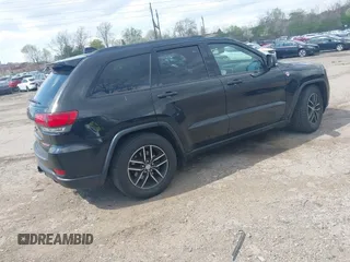 2017 Jeep Grand Cherokee Trailhawk with VIN 1C4RJFLG3HC674489, listed as a IAAI auction lot 42049006 with 91,892 mi miles and . Bid and sale history available at DreamBid. Image 4.