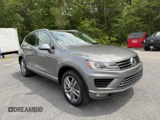 2016 Volkswagen Touareg Sport с VIN WVGEF9BP9GD007210, выставлен на аукционе Copart как лот 61608015 с пробегом 192 156 миль миль и Чистый • Clean title. История ставок и продаж доступна на DreamBid. Изображение 1.