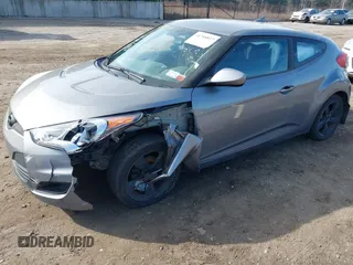 2013 Hyundai Veloster w/Black Int with VIN KMHTC6AD5DU172964, listed as a IAAI auction lot 41768827 with 102,782 mi miles and . Bid and sale history available at DreamBid. Image 6.