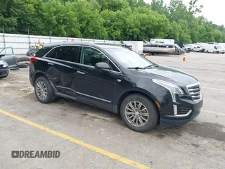 2017 Cadillac XT5 Luxury FWD with VIN 1GYKNBRS9HZ123825, listed as a IAAI auction lot 42561395 with 103,863 mi miles and . Bid and sale history available at DreamBid. Image 1.
