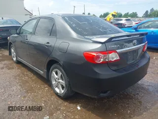2011 Toyota Corolla L with VIN 2T1BU4EE6BC679516, listed as a IAAI auction lot 42104879 with 184,014 mi miles. Bid and sale history available at carsss.com. Image 3.