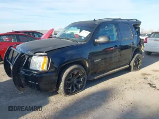 2014 GMC Yukon SLT with VIN 1GKS1CE00ER247249, listed as a IAAI auction lot 41271351 with 215,044 mi miles. Bid and sale history available at carsss.com. Image 17.