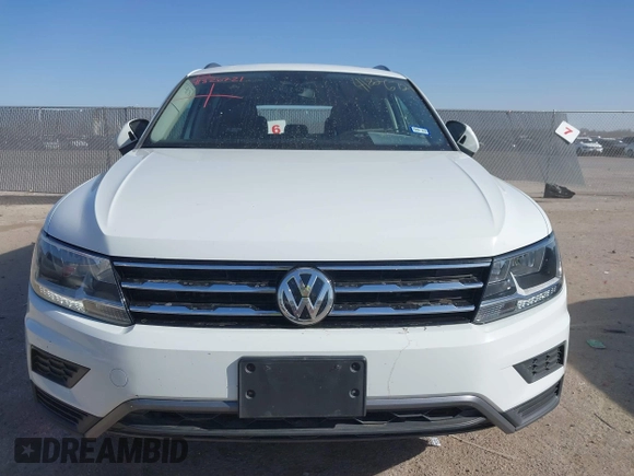 2021 Volkswagen Tiguan SE with VIN 3VV3B7AX9MM051920, listed as a IAAI auction lot 41826721 with 127,699 mi miles and . Bid and sale history available at DreamBid. Image 12.