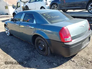 2005 Chrysler 300 with VIN 2C3JA53GX5H188833, listed as a IAAI auction lot 41906889 with 999,999 mi miles. Bid and sale history available at carsss.com. Image 3.