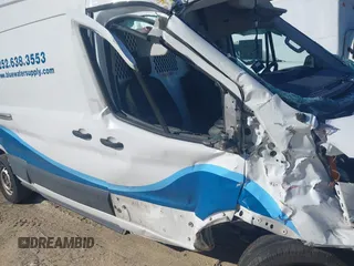 2022 Ford Transit Cargo with VIN 1FTBR3X81NKA63860, listed as a IAAI auction lot 42323904 with 94,473 mi miles and . Bid and sale history available at DreamBid. Image 17.