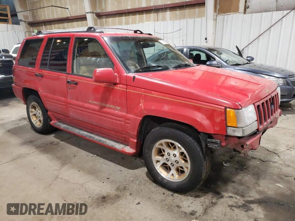 1996 Jeep Grand Cherokee Limited with VIN 1J4GZ78Y3TC186413, listed as a Copart auction lot 82370854 with 261,630 mi miles and Salvage Title. Bid and sale history available at carsss.com. Image 4.