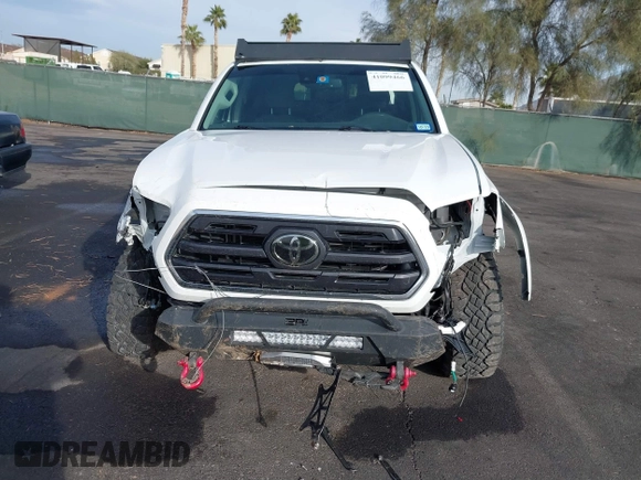 2019 Toyota Tacoma SR z VIN 3TMCZ5AN6KM284101, wystawiony jako IAAI lot #41099466 z przebiegiem 36 119 mil mil oraz . Historia ofert i sprzedaży dostępna na DreamBid. Obrazek 6.
