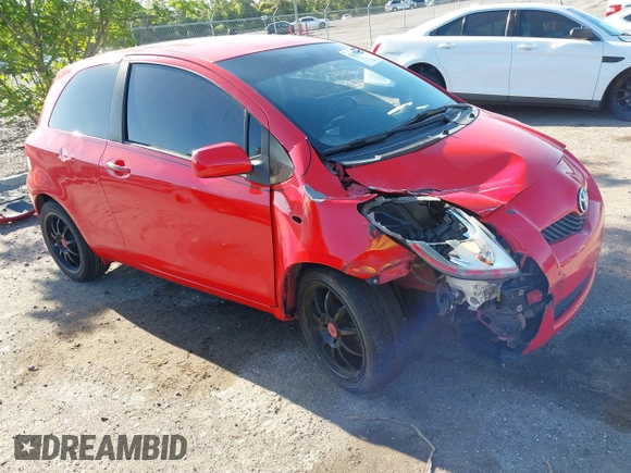 2009 Toyota Yaris with VIN JTDJT903695234623, listed as a IAAI auction lot 42027852 with 146,000 mi miles. Bid and sale history available at carsss.com. Image 1.