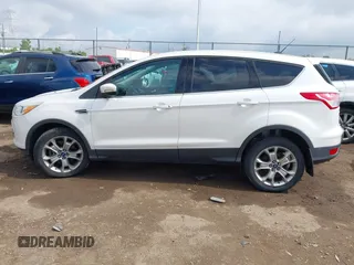 2013 Ford Escape SEL with VIN 1FMCU9HX6DUB14053, listed as a IAAI auction lot 42361297 with 144,861 mi miles and . Bid and sale history available at DreamBid. Image 14.