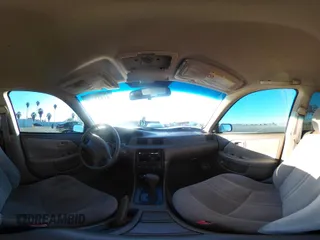 1999 Toyota Camry LE z VIN 4T1BF28K3XU931485, wystawiony jako IAAI lot #41413709 z przebiegiem 148 621 mil mil oraz . Historia ofert i sprzedaży dostępna na DreamBid. Obrazek 18.