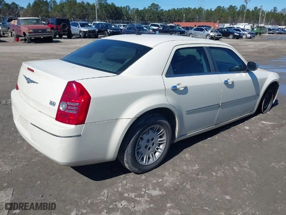 2008 Chrysler 300 Touring with VIN 2C3LA53G58H165408, listed as a IAAI auction lot 41644323 with 127,733 mi miles. Bid and sale history available at carsss.com. Image 4.