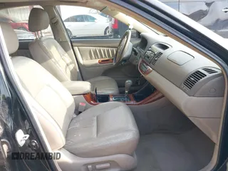 2003 Toyota Camry LE with VIN 4T1BE32K33U176270, listed as a IAAI auction lot 41995146 with 223,032 mi miles and . Bid and sale history available at DreamBid. Image 5.