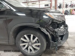2019 Honda Pilot EX-L with VIN 5FNYF6H5XKB067858, listed as a IAAI auction lot 41643807 with 102,114 mi miles and . Bid and sale history available at carsss.com. Image 12.