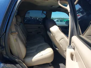 2004 Chevrolet Tahoe LT with VIN 1GNEC13Z44J125913, listed as a IAAI auction lot 42027889 with 205,796 mi miles. Bid and sale history available at carsss.com. Image 8.