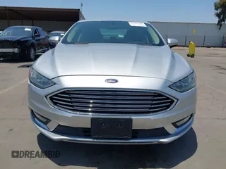 2017 Ford Fusion Hybrid SE с VIN 3FA6P0LU5HR285381, выставлен на аукционе IAAI как лот 42597789 с пробегом 129 662 миль миль и . История ставок и продаж доступна на DreamBid. Изображение 13.