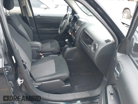 2012 Jeep Patriot Sport with VIN 1C4NJRBB7CD636000, listed as a IAAI auction lot 42106629 with 143,958 mi miles. Bid and sale history available at carsss.com. Image 5.