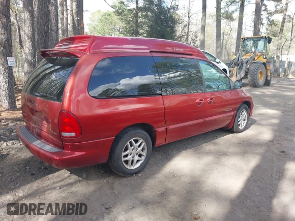 2000 Dodge Grand Caravan with VIN 1B4GT44L4YB570744, listed as a IAAI auction lot 41934100 with 174,579 mi miles and . Bid and sale history available at DreamBid. Image 4.