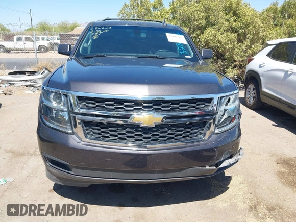 2017 Chevrolet Tahoe LS with VIN 1GNSCAKC3HR328833, listed as a IAAI auction lot 41993364 with 124,817 mi miles and . Bid and sale history available at DreamBid. Image 12.
