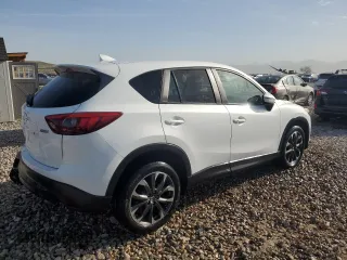 2016 Mazda CX-5 Grand Touring with VIN JM3KE4DY3G0688286, listed as a Copart auction lot 52182205 with 194,352 mi miles and Salvage Title. Bid and sale history available at DreamBid. Image 3.
