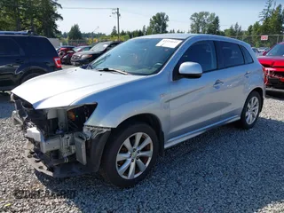 2012 Mitsubishi Outlander SE with VIN JA4AR4AU9CZ006957, listed as a IAAI auction lot 42414611 with 188,439 mi miles and . Bid and sale history available at DreamBid. Image 18.