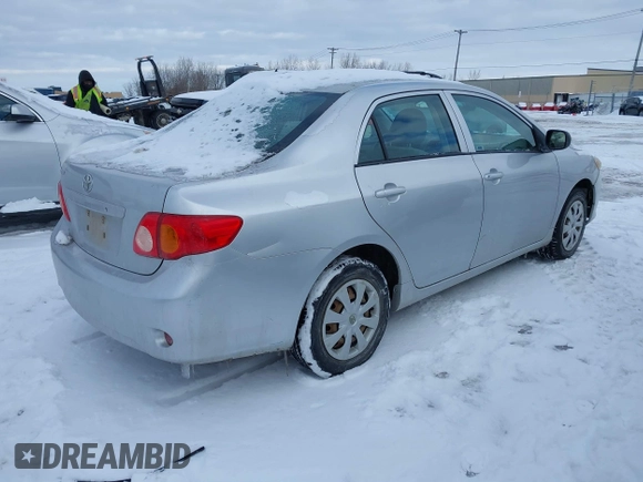 2009 Toyota Corolla with VIN 1NXBU40E69Z131984, listed as a IAAI auction lot 41542159 with 260,480 mi miles. Bid and sale history available at carsss.com. Image 4.