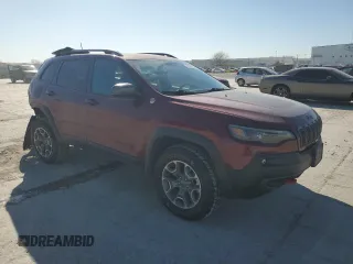 2021 Jeep Cherokee Trailhawk with VIN 1C4PJMBX7MD139411, listed as a Copart auction lot 48545725 with 54,095 mi miles and Salvage title. Bid and sale history available at DreamBid. Image 4.