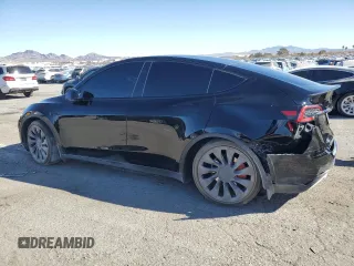 2023 Tesla Model Y Performance with VIN 7SAYGDEF8PF925238, listed as a Copart auction lot 46276925 with 28,201 mi miles and Salvage Title. Bid and sale history available at DreamBid. Image 2.